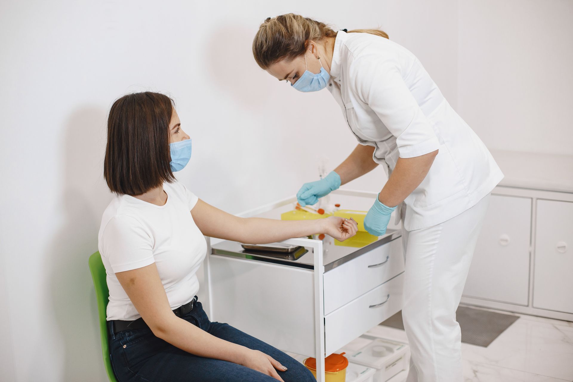 Nurse preparing a patient for a blood test